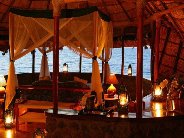 Mfangano Island Camp - bedroom at night