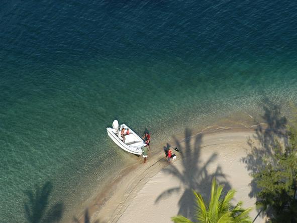 Manda Bay - boat on beach