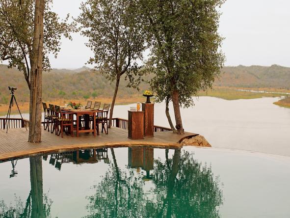 Singita Pamushana Lodge - meal beside lake