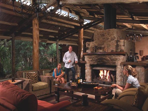 Ukhozi Lodge - lounge with fireplace