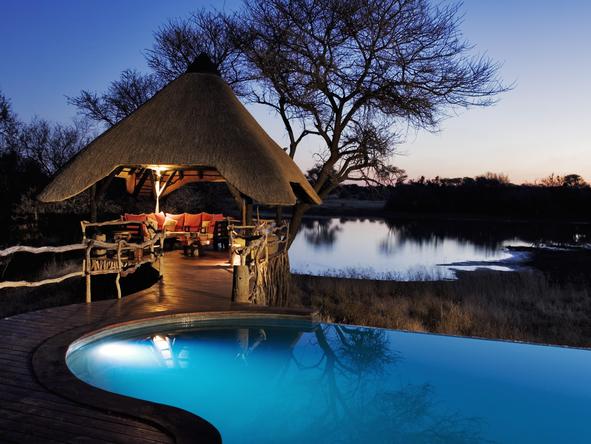 Okonjima Villa - pool at night