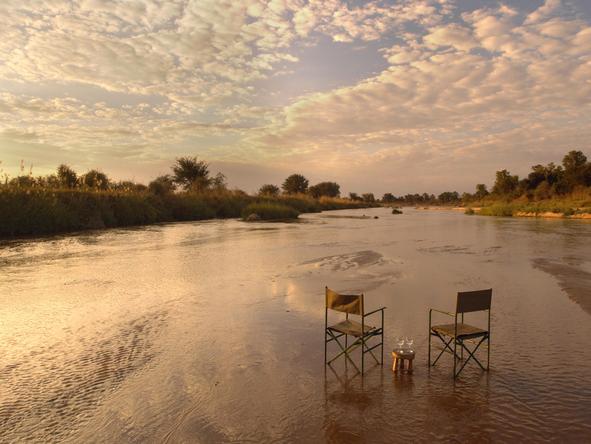 Mwaleshi Bush Camp - sundowners in the river