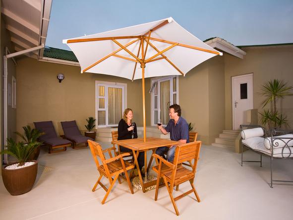 Swakopmund Guesthouse - couple in courtyard