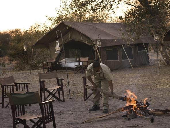 Savute Under Canvas - campfire outside tent