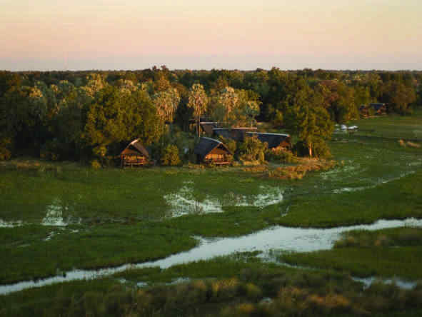 Eagle Island Camp - sun setting over the camp