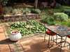 The Giraffe Manor - Sip your morning coffee beside the pond in the garden.