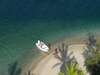 Manda Bay - boat on beach