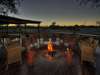 Savute Safari Lodge - campfire on deck