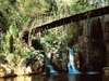 Cascades Hotel - swing bridge over the river