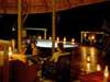 Kwando Lagoon Camp - lounge at night 