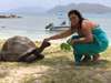 Sharlene Swart - interacting with a local tortoise on the Seychelles Islands